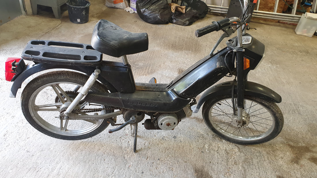 Mobylette sortie de grange